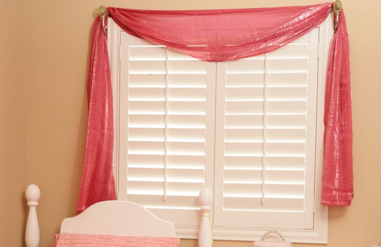 Kid's bedroom with plantation shutters.